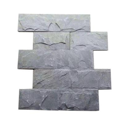 China Eco - Friendly Exterior Decorative Black Slate Wall Mushroom Stone for sale