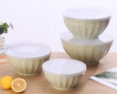 China Sustainable 4pcs Round Plastic Salad Bowl Sets Food Fruit Bowl With Lid for sale