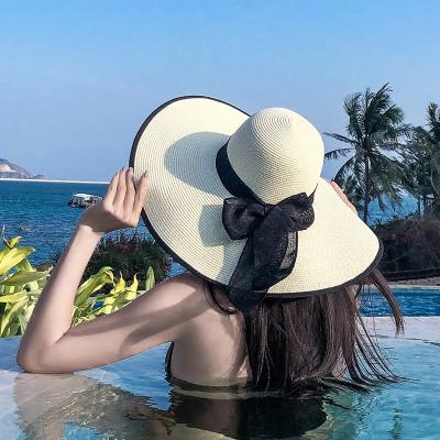 China Straw Hat Fashion Wide Brim Straw Floppy Hat Summer Sun Paper Brim Beach Women's Wide Brim Beach Hat for sale