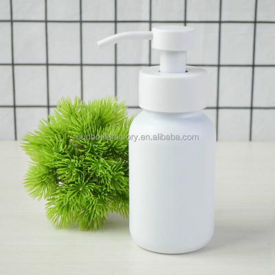 China Personal Care 250ml Amber Glass Foaming Soap Pump Bottle With Stainless Steel Foaming Pump for sale