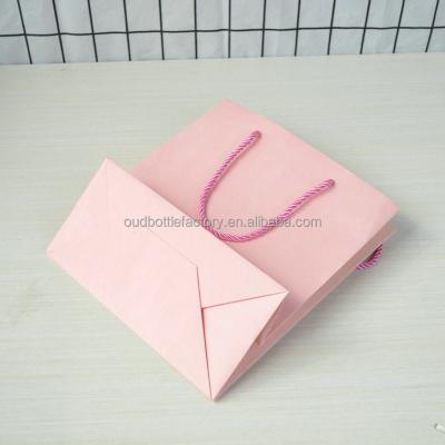 China Recycled Materials Custom Printed Your Own Logo Cardboard Packaging White Brown Kraft Paper Gift Craft Shopping Paper Bag With Handles for sale