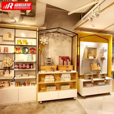 China Single-Sided Hot-selling Bookshelves Simple Metallic Retail Laminate Interior Design Bookstore Side Gift Retail Stationary Store Shelves for sale