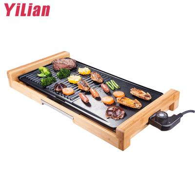 China 4 Person Bamboo BBQ Machine Household Hotel Body Smokeless Indoor Smokeless Electric Grill Grill Non-stick Grill for sale