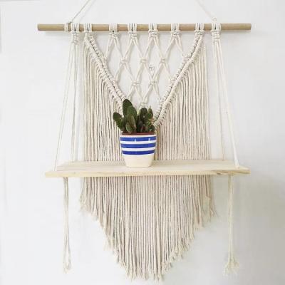 China Eco-Friendly Boho Decorative Macrame Wall Hanging Shelf Storage Macrame Plant Floating Wood Hangers for sale