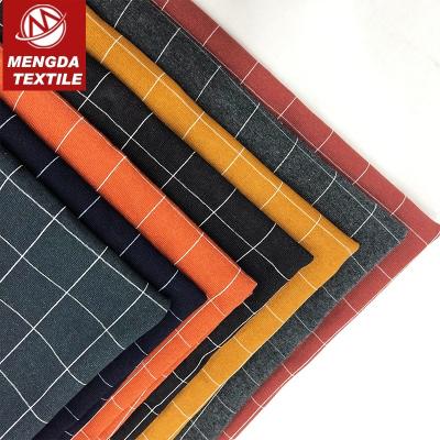 China Wash Dealing 260g Cotton Polyester Spandex Knitted Plaid Denim Fabric In Stock for sale