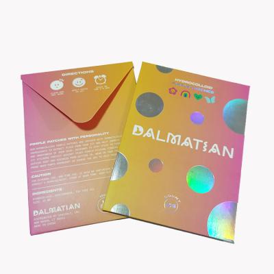 China Small and Fancy Personalized Logo Shiny Holographic Foil Paper Wraps Cosmetic Package Small Wrap for sale