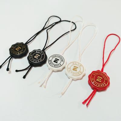 China Viable Custom Plastic Watch Seal Tag With Brand Logo Seal Security Tag for sale