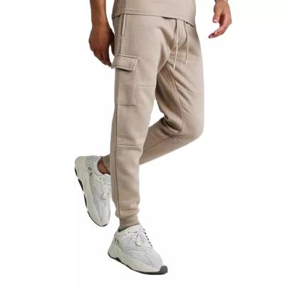 China Anti-Wrinkle Customize Logo Mens Organic Cargo Pants Beige Cotton Track Pants Mens Joggers for sale