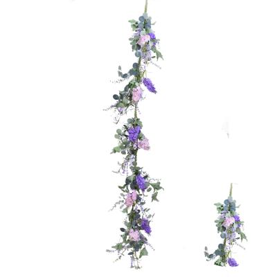 China Environmental protection green hand wrapped decoration simulation garland artificial spring floral wreath for home decoration for sale