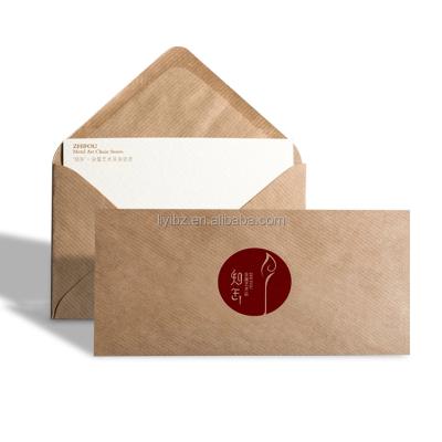 China Handmade Professional Factory 220 * 110mm Customized Kraft Paper Material Red Logo Western Style Adhesive Envelope for sale