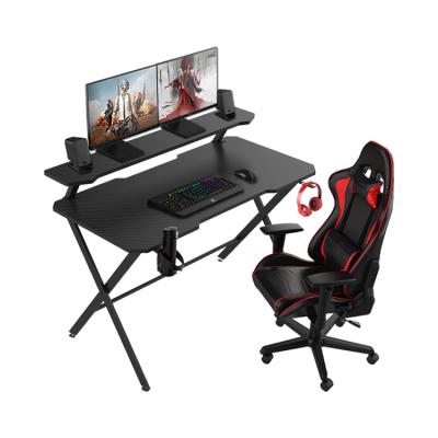 China Expandable Computer Gaming Table With Stand PC E-sports Gamer Desk With Monitor Cool Shelf Black Gaming Desk for sale