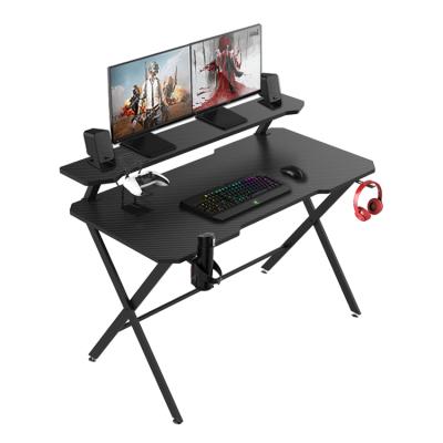 China Expandable Computer Gaming Table With Monitor Stand PC E-sports Gamer Desk With Cool Black Shelf Gaming Desk for sale