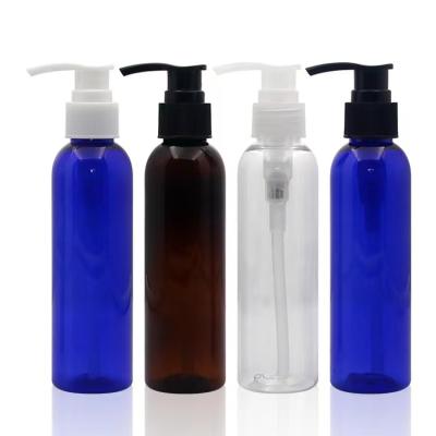 China Free Sample High Quality Cosmetic 150ml 100ml Round Clear Blue Amber Pet Plastic Hand Sanitizer Bottle With Sprayer Pump For Shampoo for sale