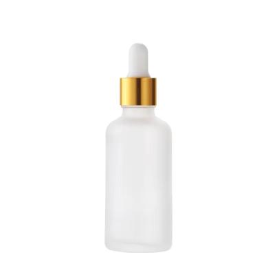 China Wholesale 30ml 1oz Cosmetic Frosted Serum Dropper Essential Oil Clear Glass Bottle With Rose Gold Lid for sale