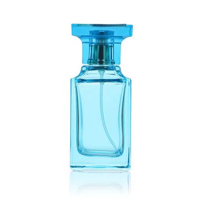 China Cosmetic 50ml 30ml 100ml glass empty black red blue perfume bottle with spray glass bottle for sale