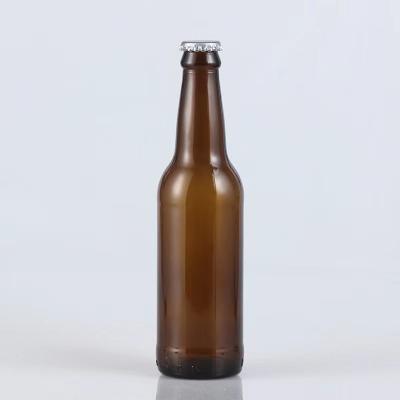 China 330ml 12oz Drink In Stock Round Empty Amber Glass Beer Bottle Empty With Crown Cap for sale