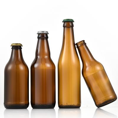 China Hot Sales High Quality Beverage Customize 250ml 330ml 500ml Empty Glass Amber Beer Bottle With Crown Cap for sale