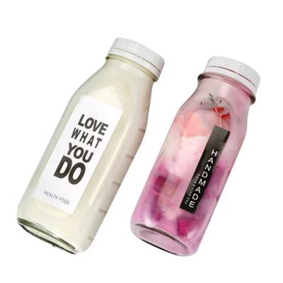 China Wholesale Luxury Clear Empty Glass Square 300ml 500ml 1000ml Beverage Juice Bottle For Milk for sale