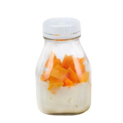 China 500ml 1000ml Empty Square Beverage Glass Bottles For Milk Juice Beverage With Plastic Tamper Proof Lid for sale