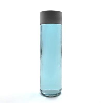 China 350ml 500ml Voss Glass Empty Round Clear Beverage Water Bottle With Plastic Screw Top For Mineral Water for sale