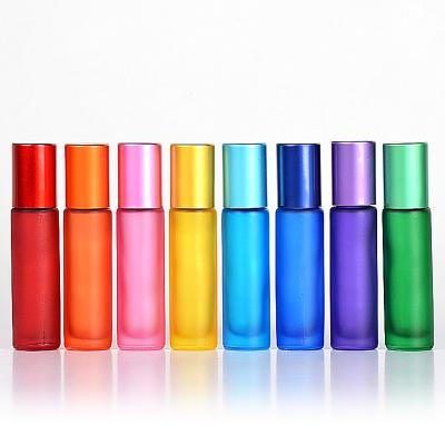 China Free Samples 5ml 10ml Cosmetic Custom Colored Glass Roll On Bottle With Stainless Trackball For Essential Oil for sale