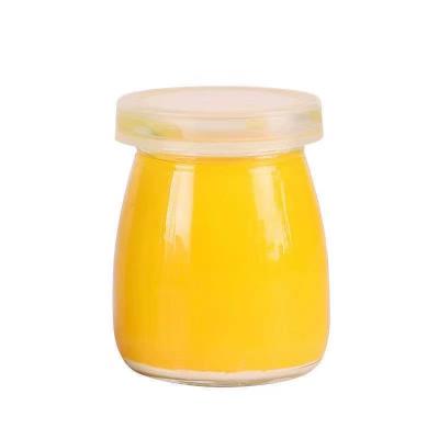 China Food 100ml wholesale custom 150ml pudding glass jar with plastic lid for milk and yogurt for sale