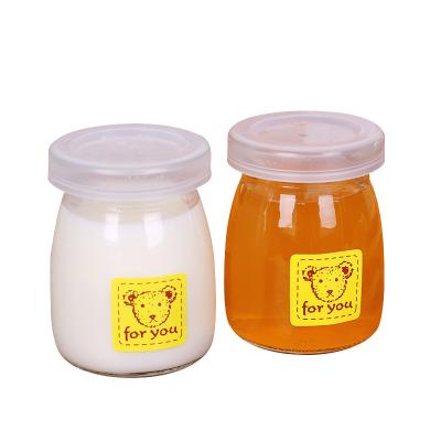 China Food factory hot sales 100ml 150ml pudding jar jam ovenproof glass jar with lid for milk and yogurt for sale