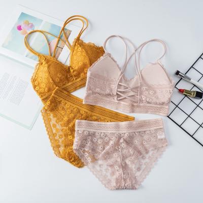 China Breathable Womens Underwear Lace Hollow Padded None Back Closure Cross Ladies Bras And Panty Sets for sale