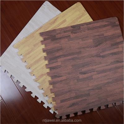 China Washable Wood Effect Interlocking Eva Foam Ground Pad Mat 30*30*0.8cm for sale