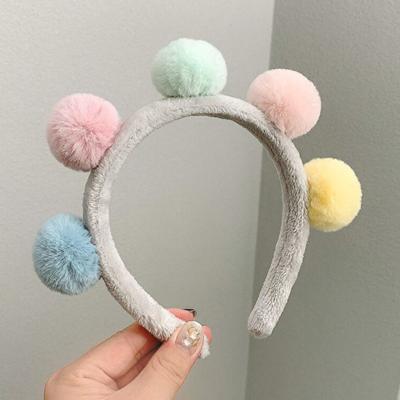 China Ladies Smart Casual Luminous Headband Plush Ball Plush Ball Candy Color Cute Girl Headband for sale