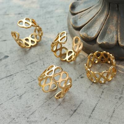 China TRENDY Hot selling women's stainless steel gold plated wide ring face dome hollow opening design ring for sale