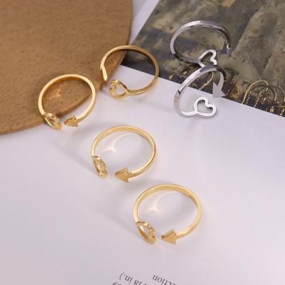 China Trendy Simple Designs Stainless Steel Gold Plated Heart Arrow Seal Jewelry Open Ring for sale