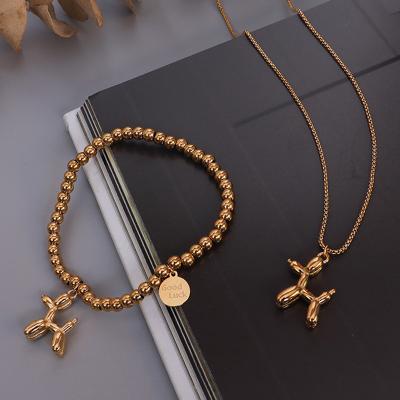 China Fashionable Cute Soft Cute Thin Necklace Dog Girl Shape Elastic Rope Beaded Bracelet Jewelry Set for sale