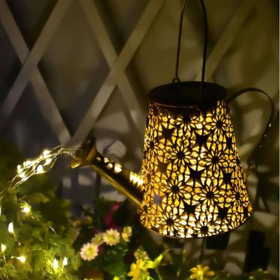 China Garden Waterproof Hanging Solar Garden Lights Retro Decorative Metal Watering Can Lights With Shepherd Hook for sale