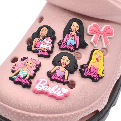 China Hindrance Charm New Fashion PVC Croc Shoe Charms Cartoon Pink Doll Charms Babi Croc Shoe Charms for sale