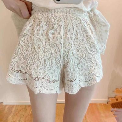 China new Anti-wrinkle fashion crochet shorts ladies hand embroidery hollow pattern splicing woven crochet pants for sale