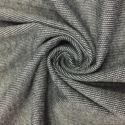 China Soft Hand Feel Core Spun Yarn Wicker Jacquard Elastic Knitted Knitting Jacquard Fabric for sale