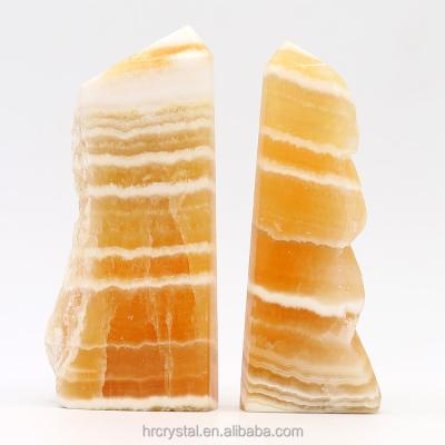 China Gemstone Crystal Tower Polished Orange Calcite Crystal Tower For Healing Decoration China Rough Fengshui for sale