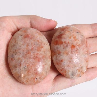 China Healing Crystal Tumbled Gemstone Popular Colorful China Energy SunStone Tumbled Palm Stone For Sale for sale