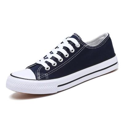 China Fashion Trend Custom Fashion Canvas Vulcanized Sole Rubber Men Women Casual Shoes Trendy Canvas Shoes for sale