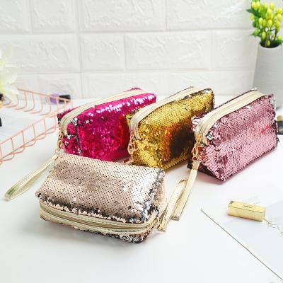 China 2020 New Glitter Sequins Travel Organizer Fashion Handbags Plush Girl Zipper Cosmetic Bag Fashionable Cute Lady Makeup Bags for sale