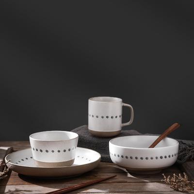 China Viable Wholesale Hand Painted Rustic White Dot Japanese Style Stoneware 16pcs Restaurant Dinnerware Sets for sale