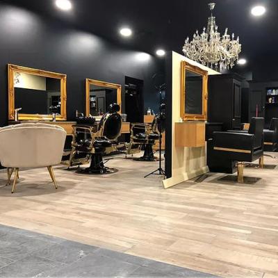 China Modern Barber Shop Furniture Black And Gold Armchair Barber Chair And Mirror Set for sale