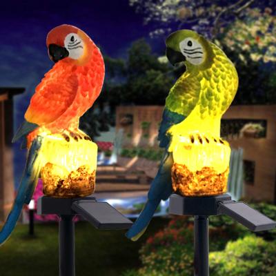 China Solar Powered Solar Garden Stake Lights Resin Craft Parrot Solar Stake Light Waterproof Lawn Ground Lights for sale