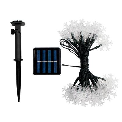 China Solar Powered Waterproof Solar String Lights Led Outdoor Snowflake Christmas Garden Decoration Light for sale