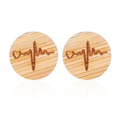 China TRENDY Fashion Wooden Stud Earrings For Women 2021 Korean Love Butterfly Rattan Christmas Animal Jewelry for sale