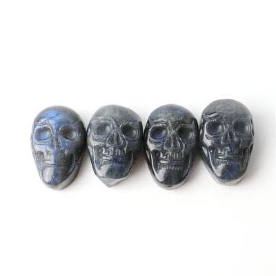 China China wholesale carved natural blue crystal skulls labradorite stone carving skulls ring noodles for sale