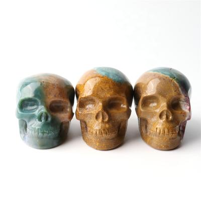 China China Hand Carved Halloween Natural Crystal Folk Crafts Skulls Green Ocean Jasper Skulls For Decoration for sale