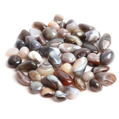 China China Natural Stripe Persian Agate Tumbled Silk Crystal Tumbled Gravel Crystal Gravels for sale