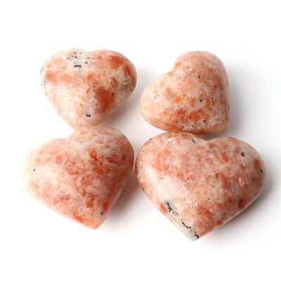 China China gold heart carving quartz heart shape natural stone sunstone crystal hand palm for sale